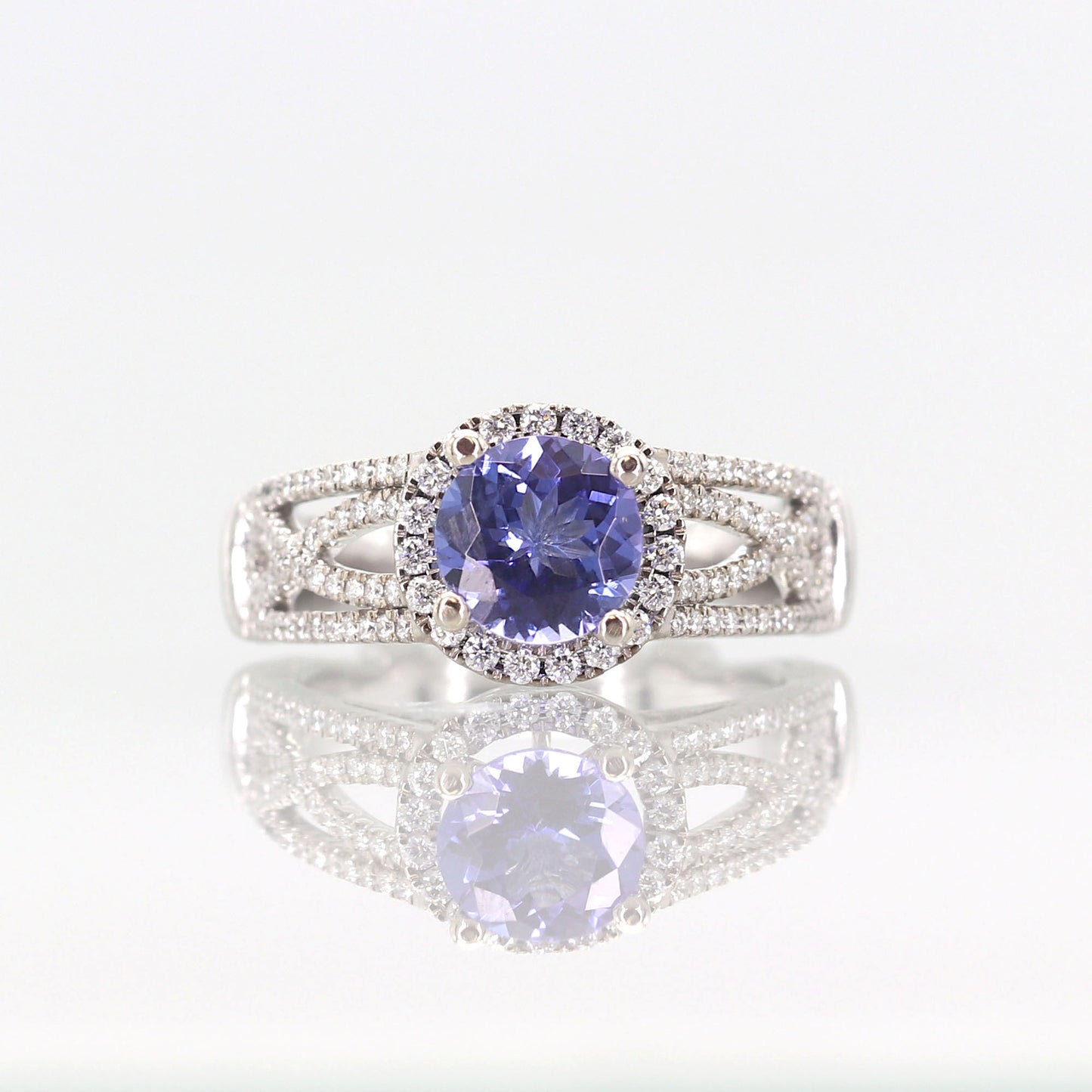 18K WHITE GOLD TANZANITE DIAMOND HALO RING