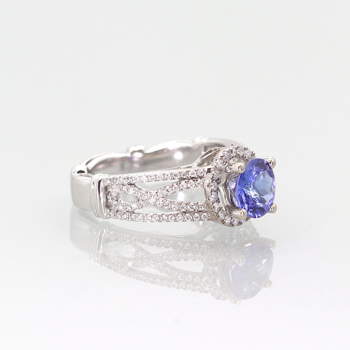 18K WHITE GOLD TANZANITE DIAMOND HALO RING