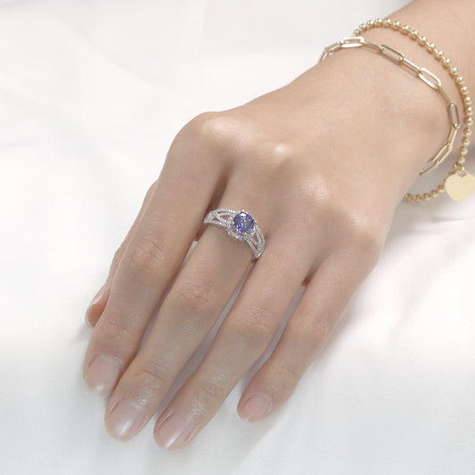 18K WHITE GOLD TANZANITE DIAMOND HALO RING