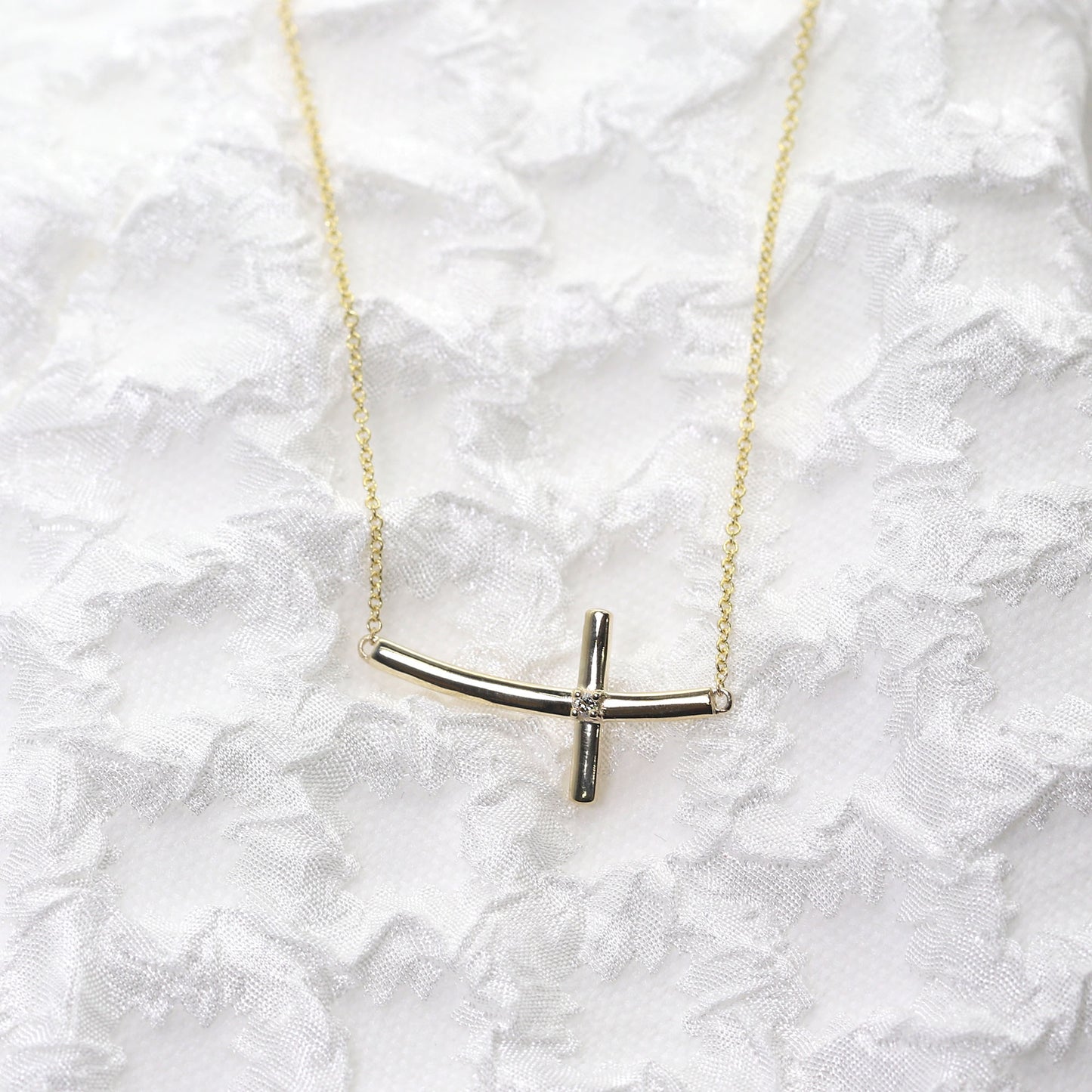 14K 1 DIAMOND SIDEWAYS CROSS NECKLACE