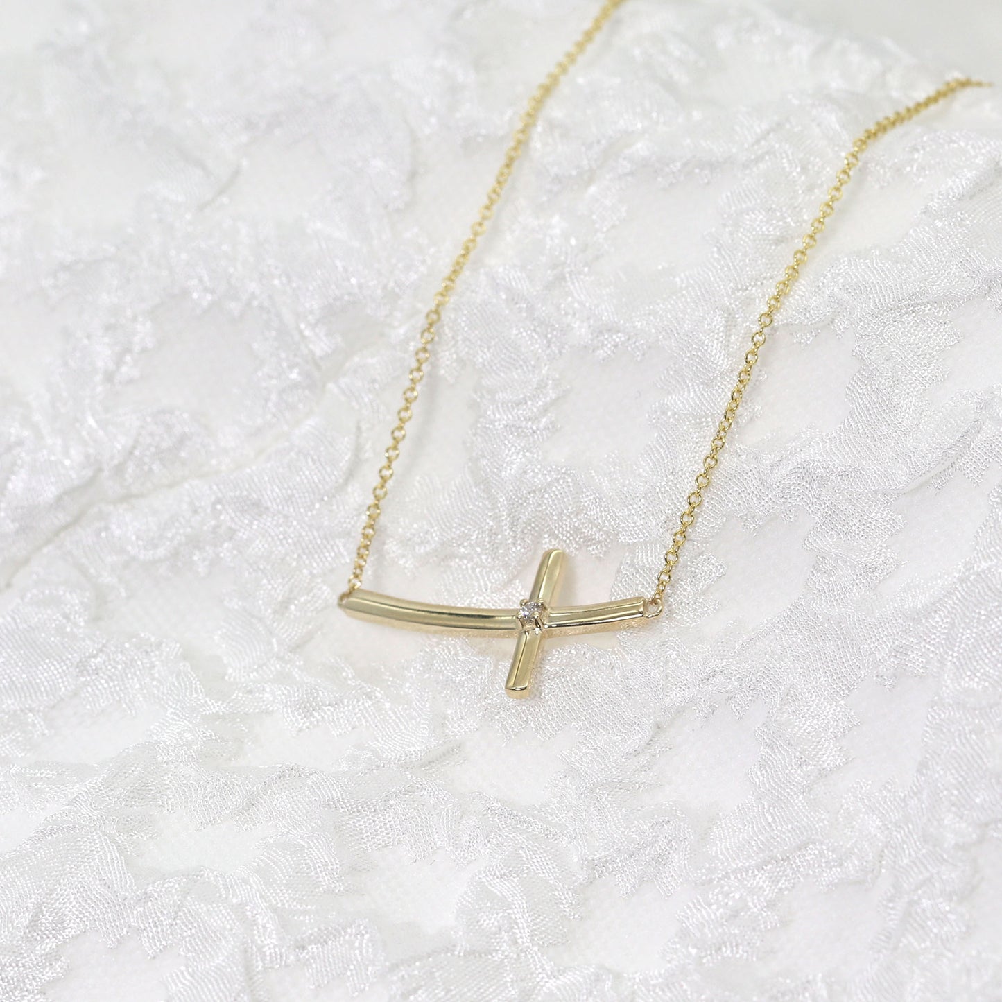 14K 1 DIAMOND SIDEWAYS CROSS NECKLACE