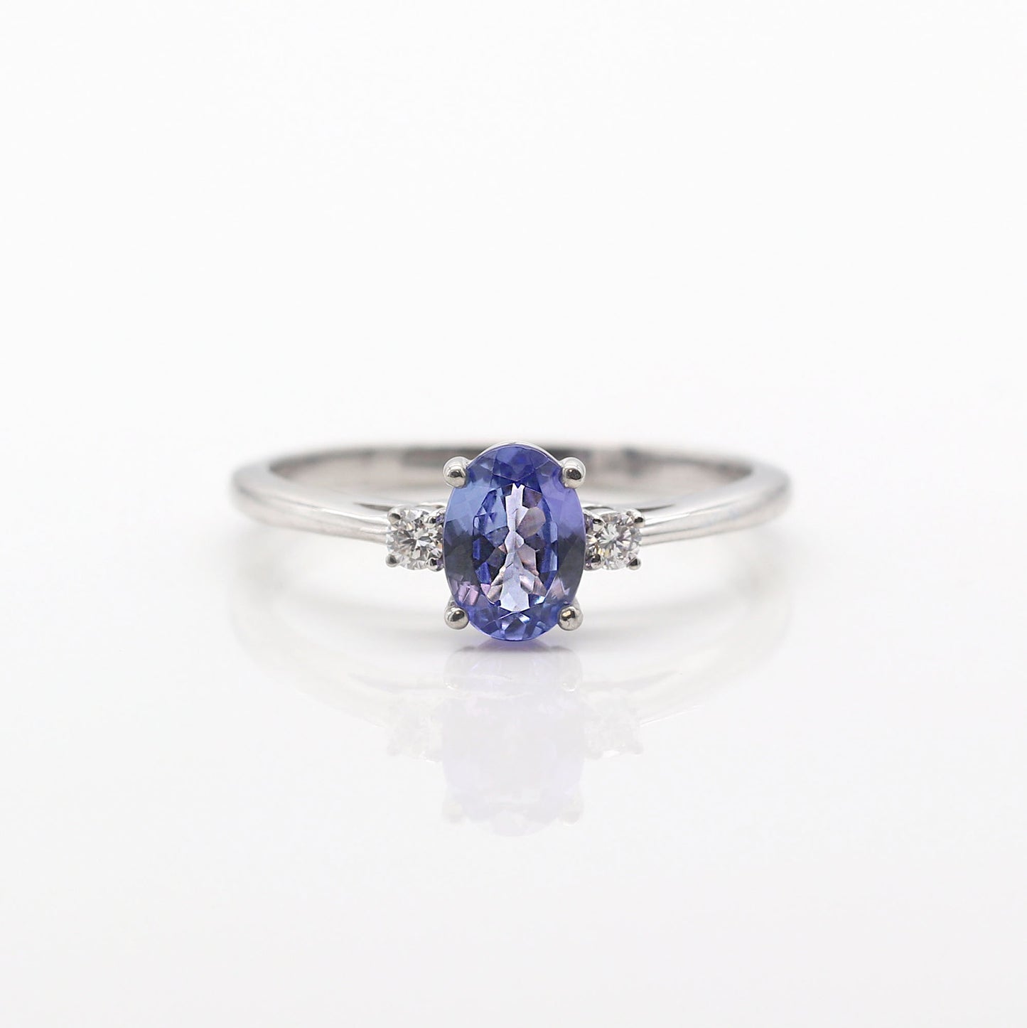 14K OVAL TANZANITE 0.06CT DIAMOND RING