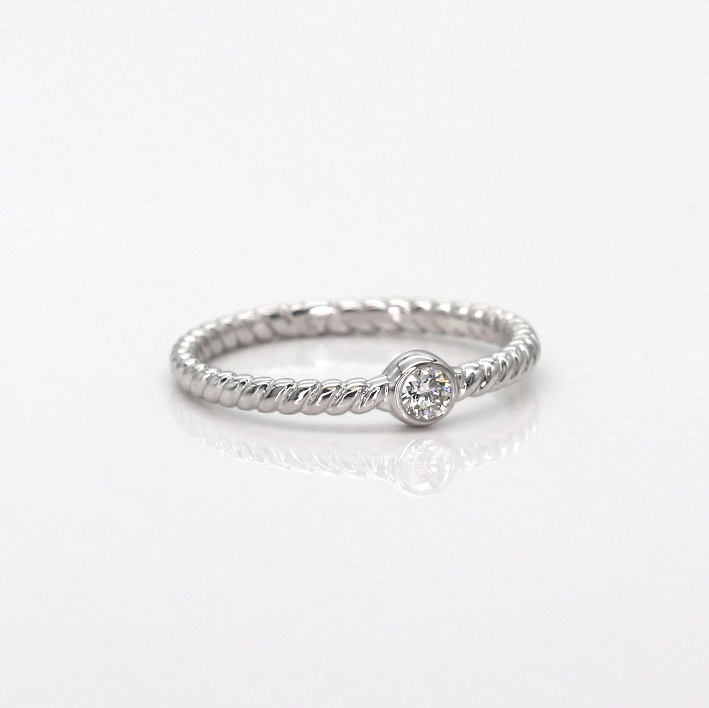 14K 0.08CT DIAMOND BEZEL TWIST RING