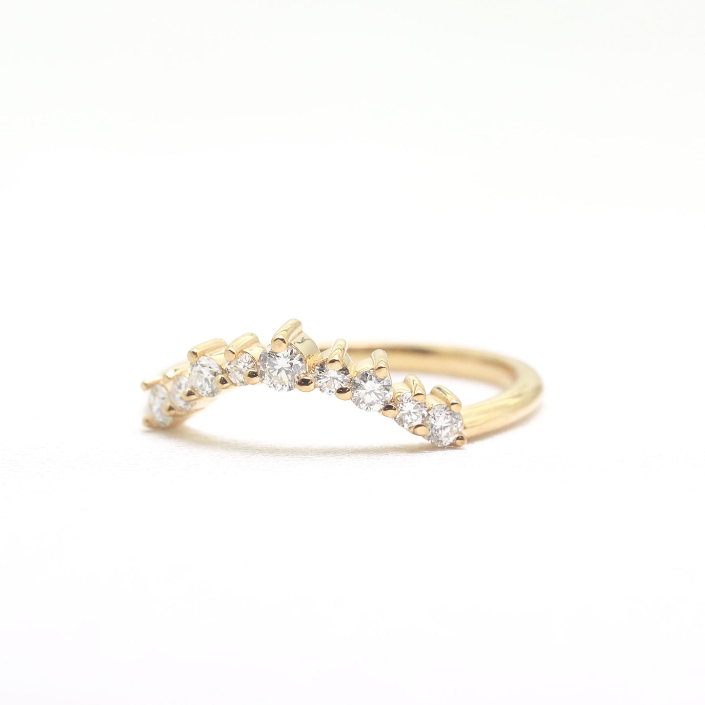 14K 0.27CT DIAMOND CURVED BAND