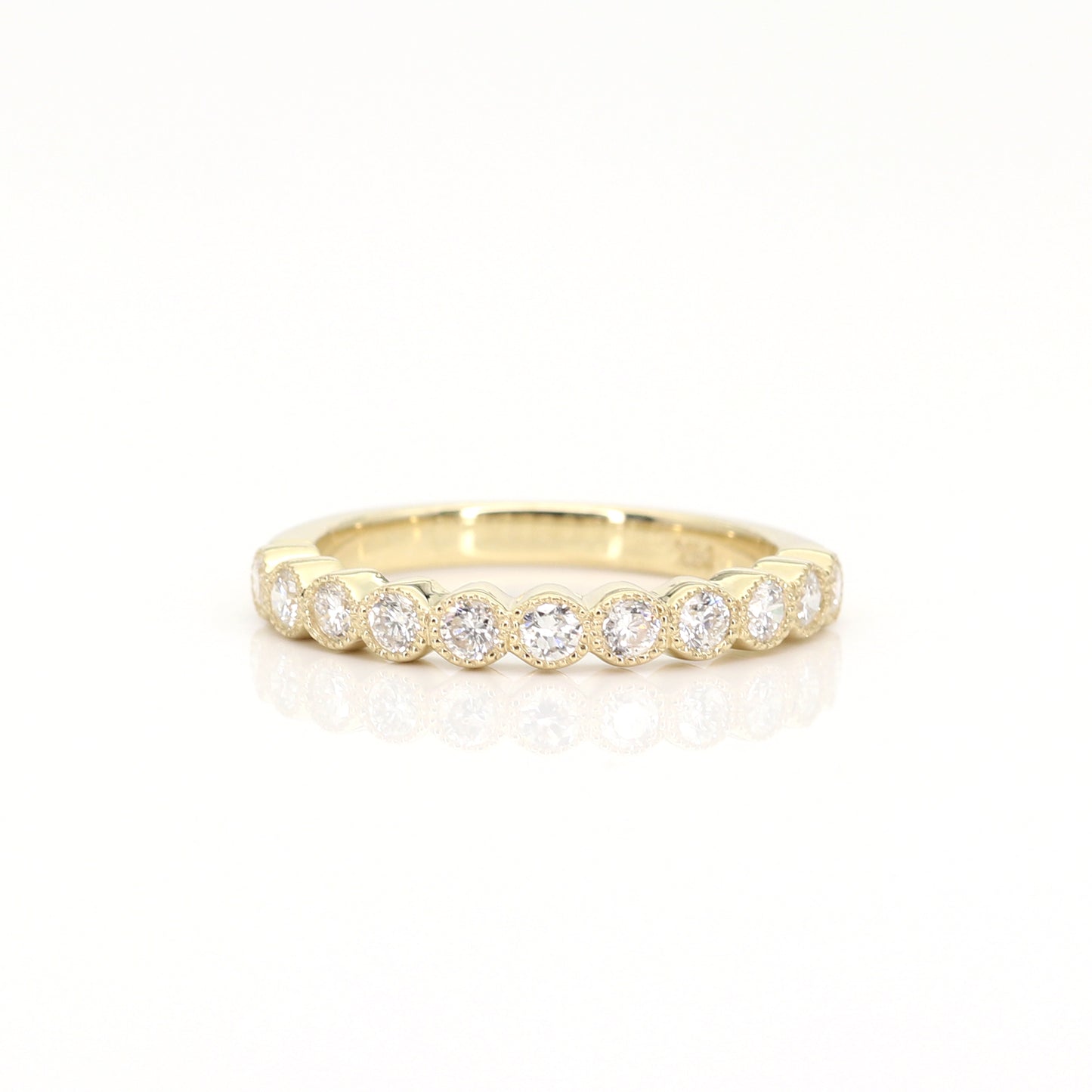 14K 0.55CT DIAMOND BEZEL MILGRAIN BAND