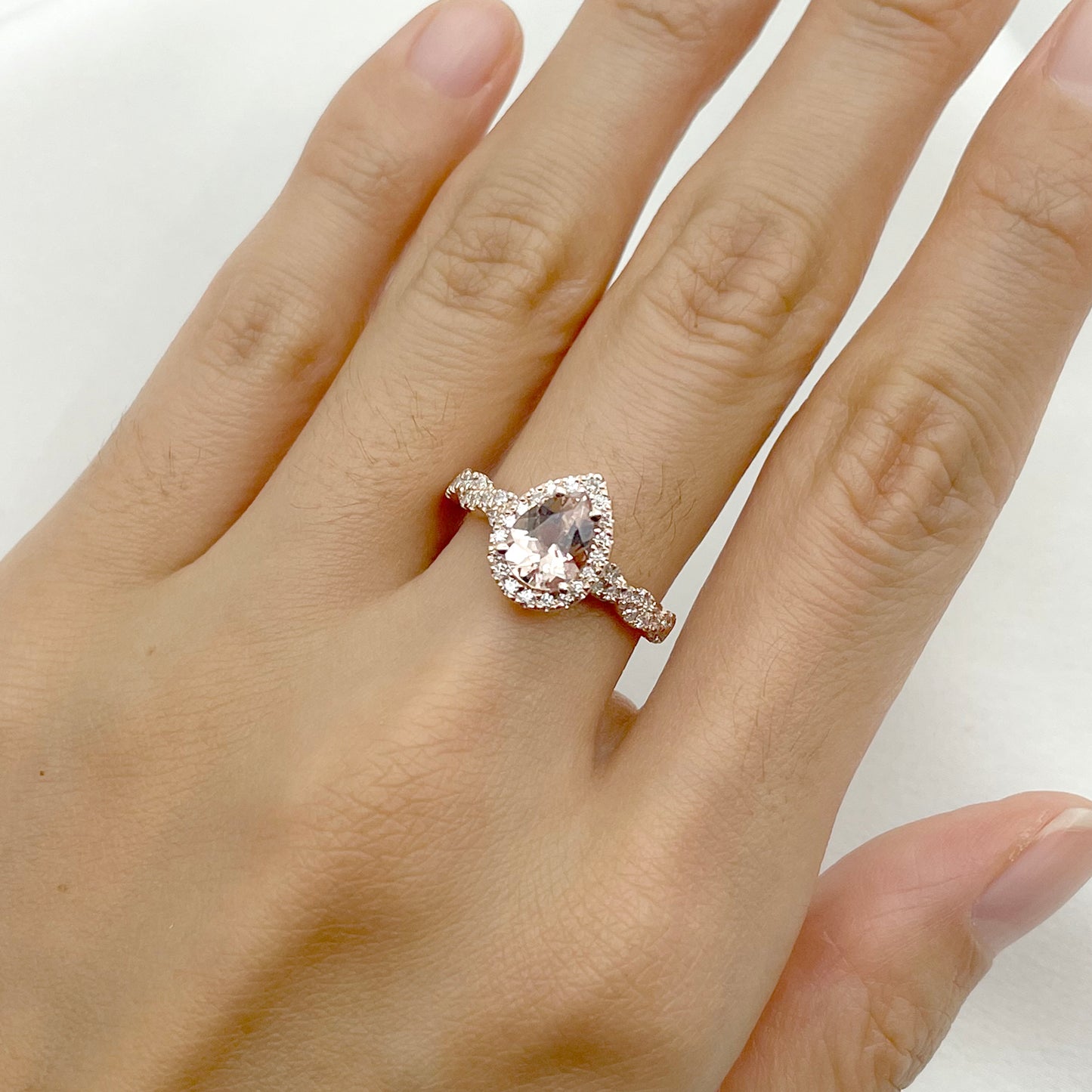 14K PEAR MORGANITE DIAMOND HALO TWIST RING