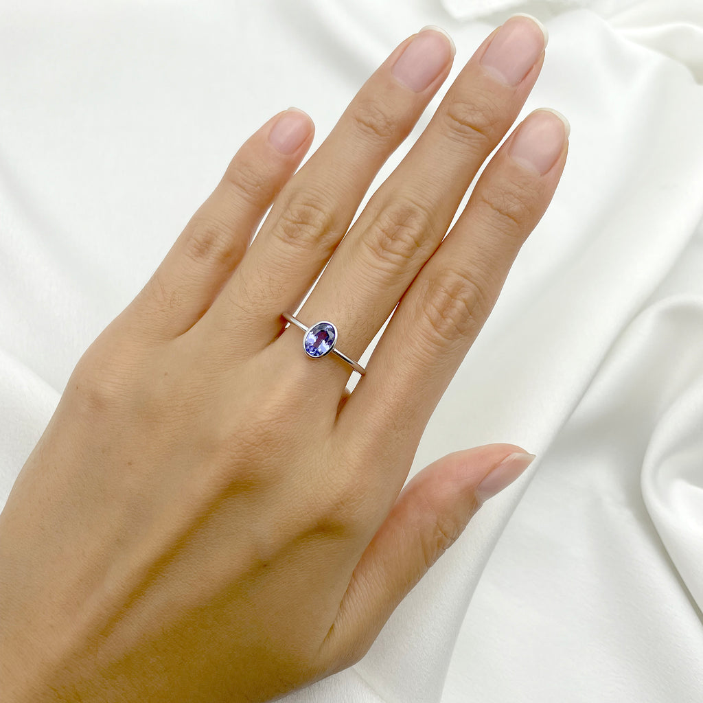 14K OVAL TANZANITE BEZEL SOLITAIRE RING