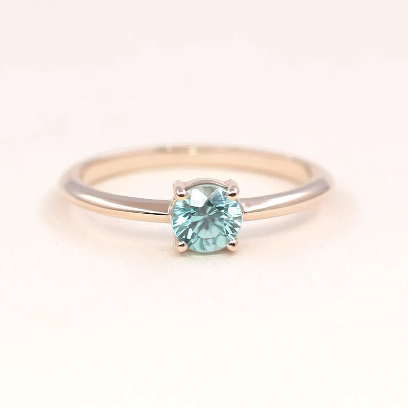 14K ROUND BLUE ZIRCON SOLITAIRE RING