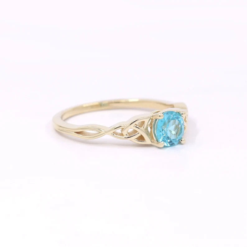 14K BLUE ZIRCON TWIST RING