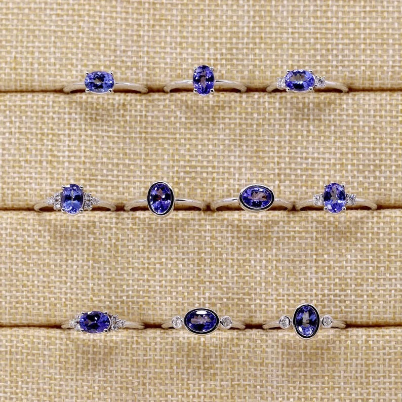 14K OVAL TANZANITE 0.10CT DIAMOND RING