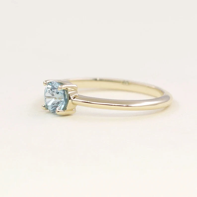 14K ROUND BLUE ZIRCON SOLITAIRE RING