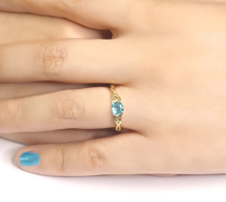 14K BLUE ZIRCON TWIST RING