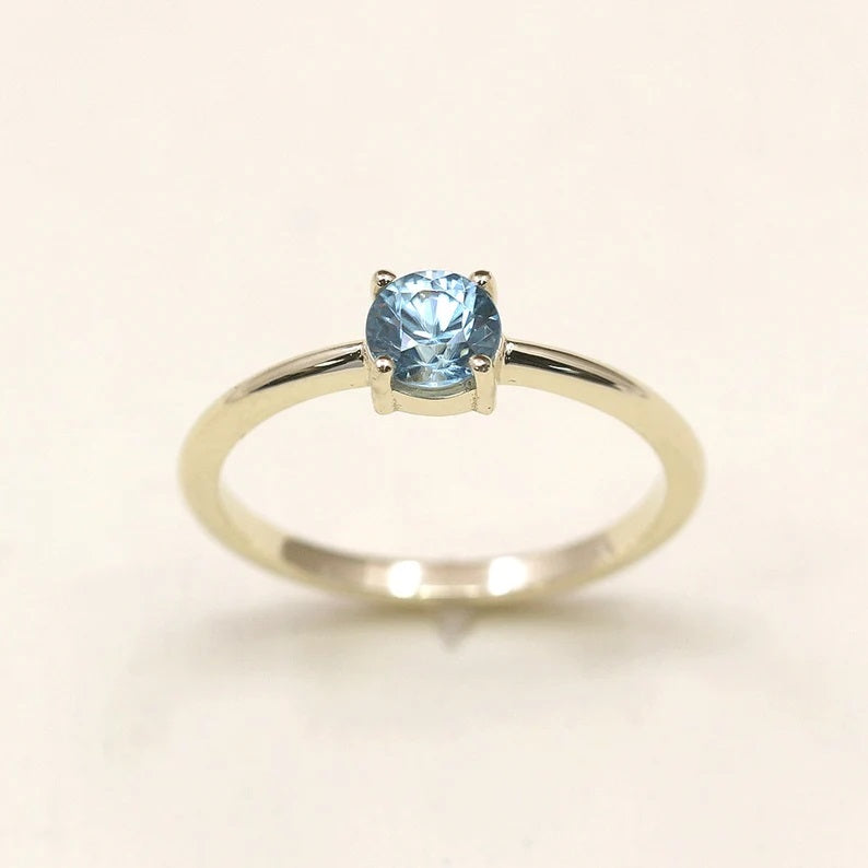 14K ROUND BLUE ZIRCON SOLITAIRE RING