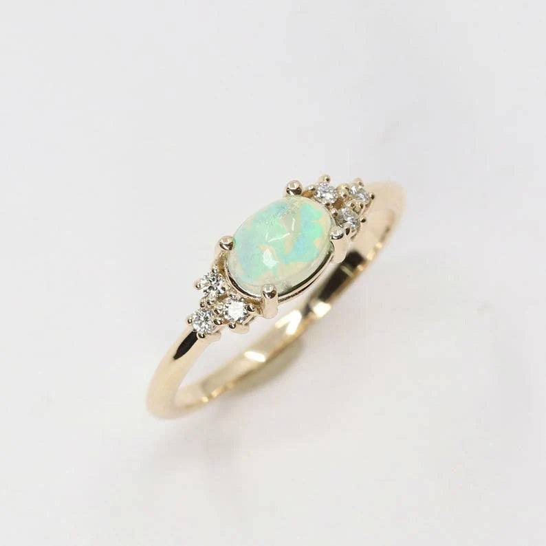 14K OVAL OPAL DIAMOND CLUSTER RING