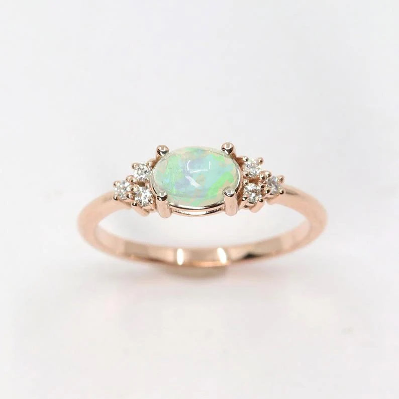 14K OVAL OPAL DIAMOND CLUSTER RING