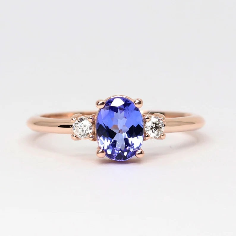 14K OVAL TANZANITE 0.10CT DIAMOND RING