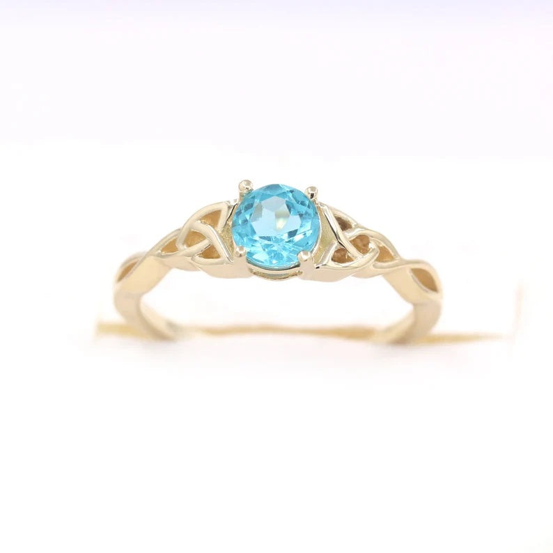 14K BLUE ZIRCON TWIST RING