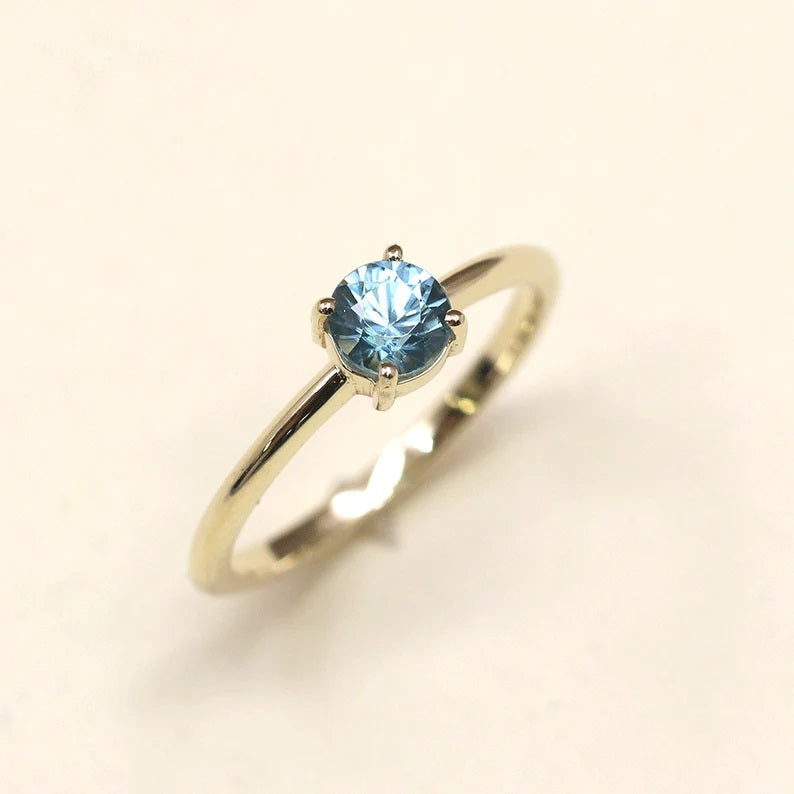 14K ROUND BLUE ZIRCON SOLITAIRE RING