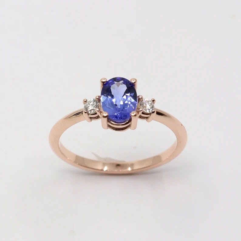 14K OVAL TANZANITE 0.10CT DIAMOND RING