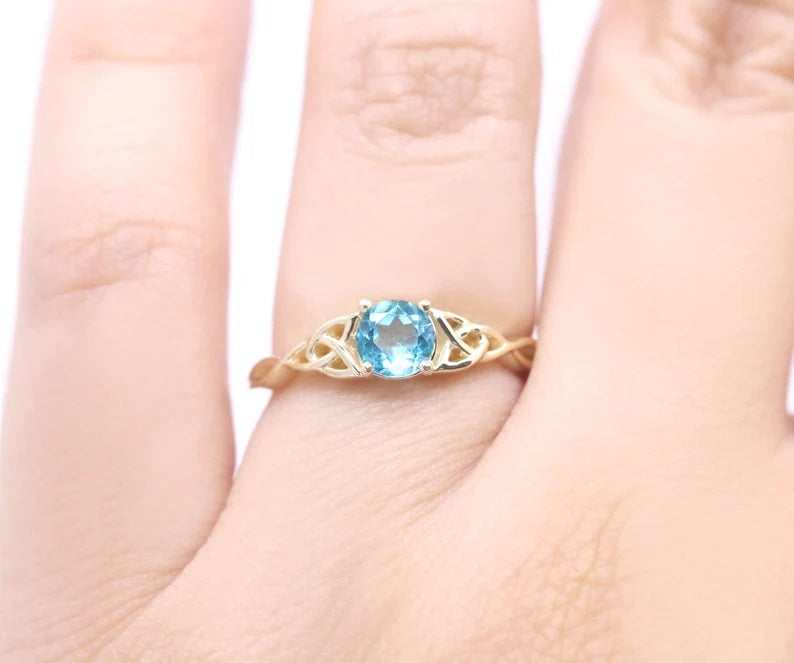 14K BLUE ZIRCON TWIST RING