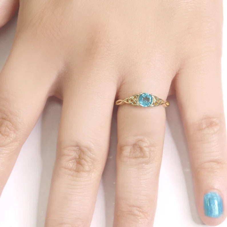 14K BLUE ZIRCON TWIST RING