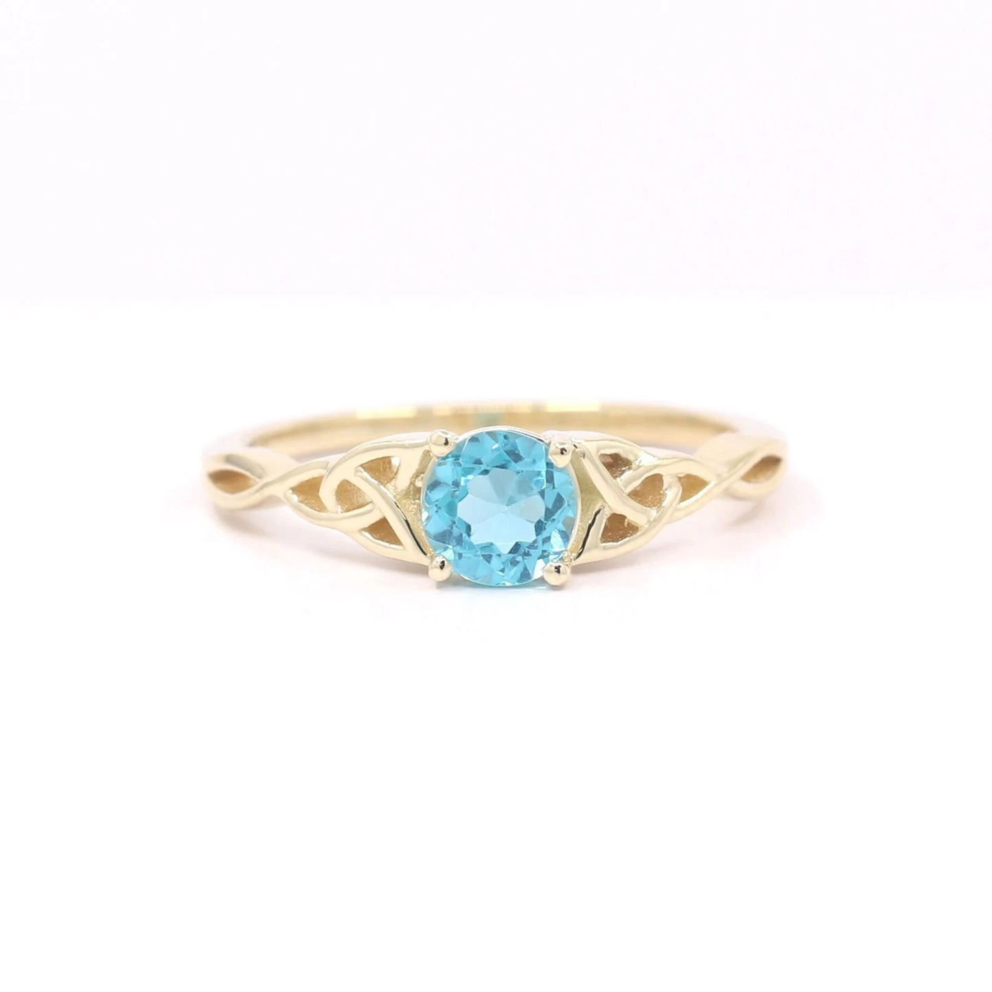 14K BLUE ZIRCON TWIST RING