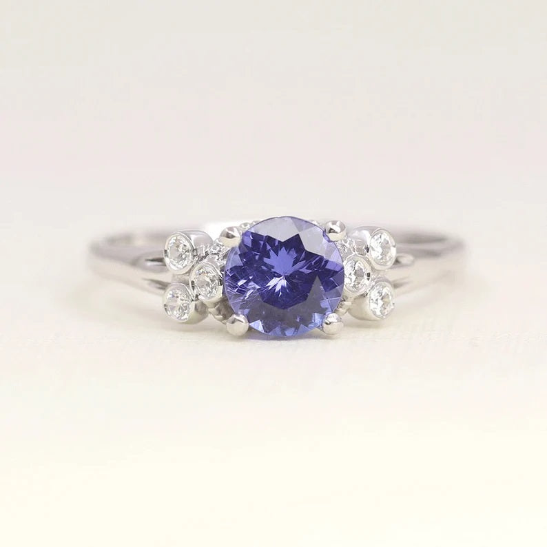 14K ROUND TANZANITE DIAMOND BEZEL CLUSTER RING