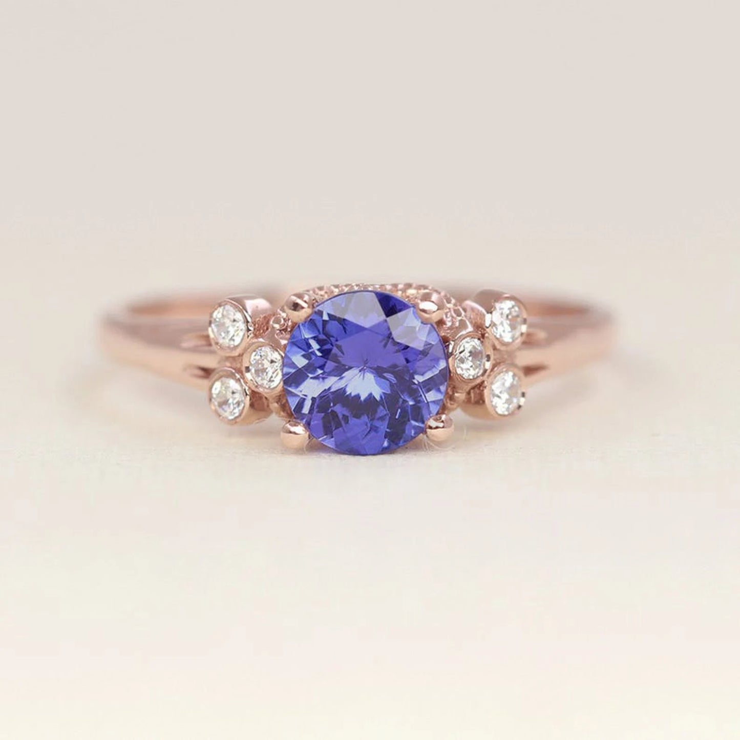 14K ROUND TANZANITE DIAMOND BEZEL CLUSTER RING