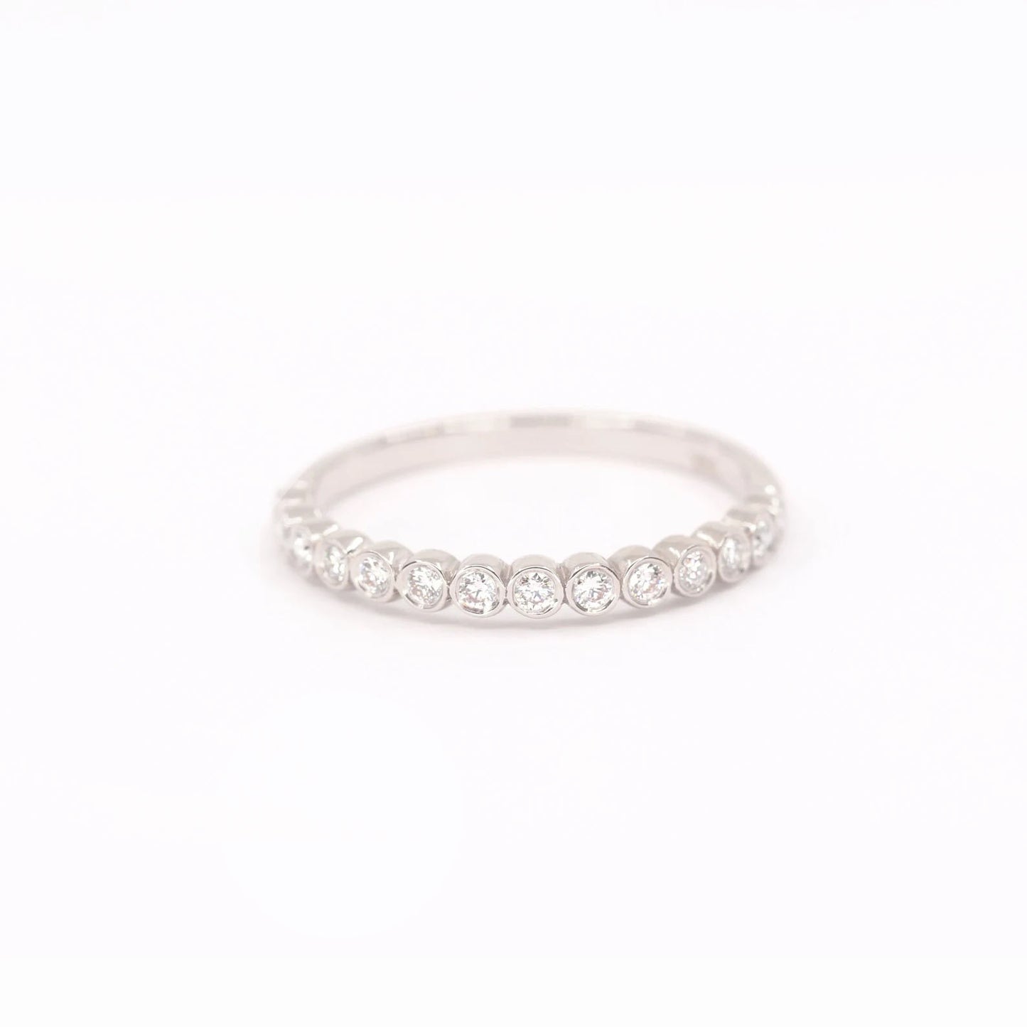 14K 0.23CT DIAMOND BEZEL HALF ETERNITY BAND