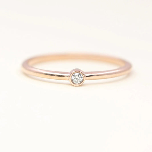 14K 0.03CT DIAMOND BEZEL SOLITAIRE RING