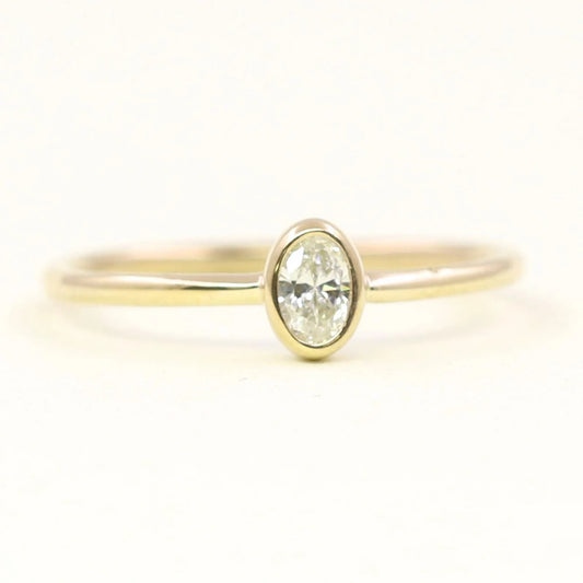 14K 0.15CT OVAL DIAMOND BEZEL SOLITAIRE RING