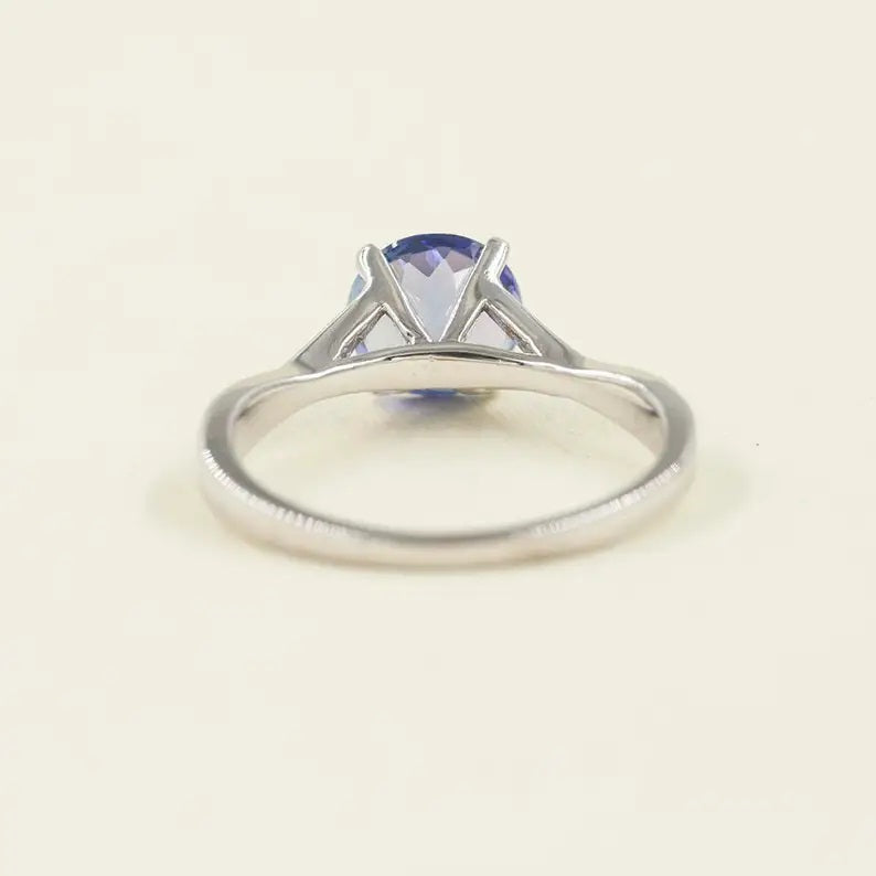 14K TANZANITE TWIST SOLITAIRE RING