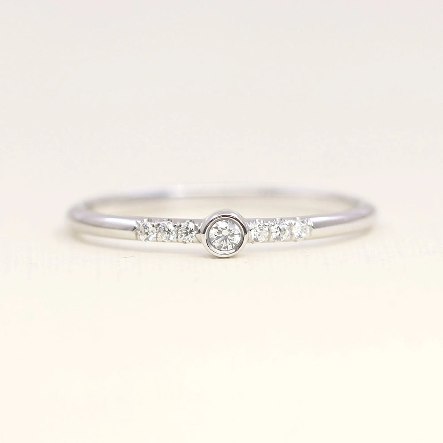 14K 0.10CT DIAMOND BEZEL RING