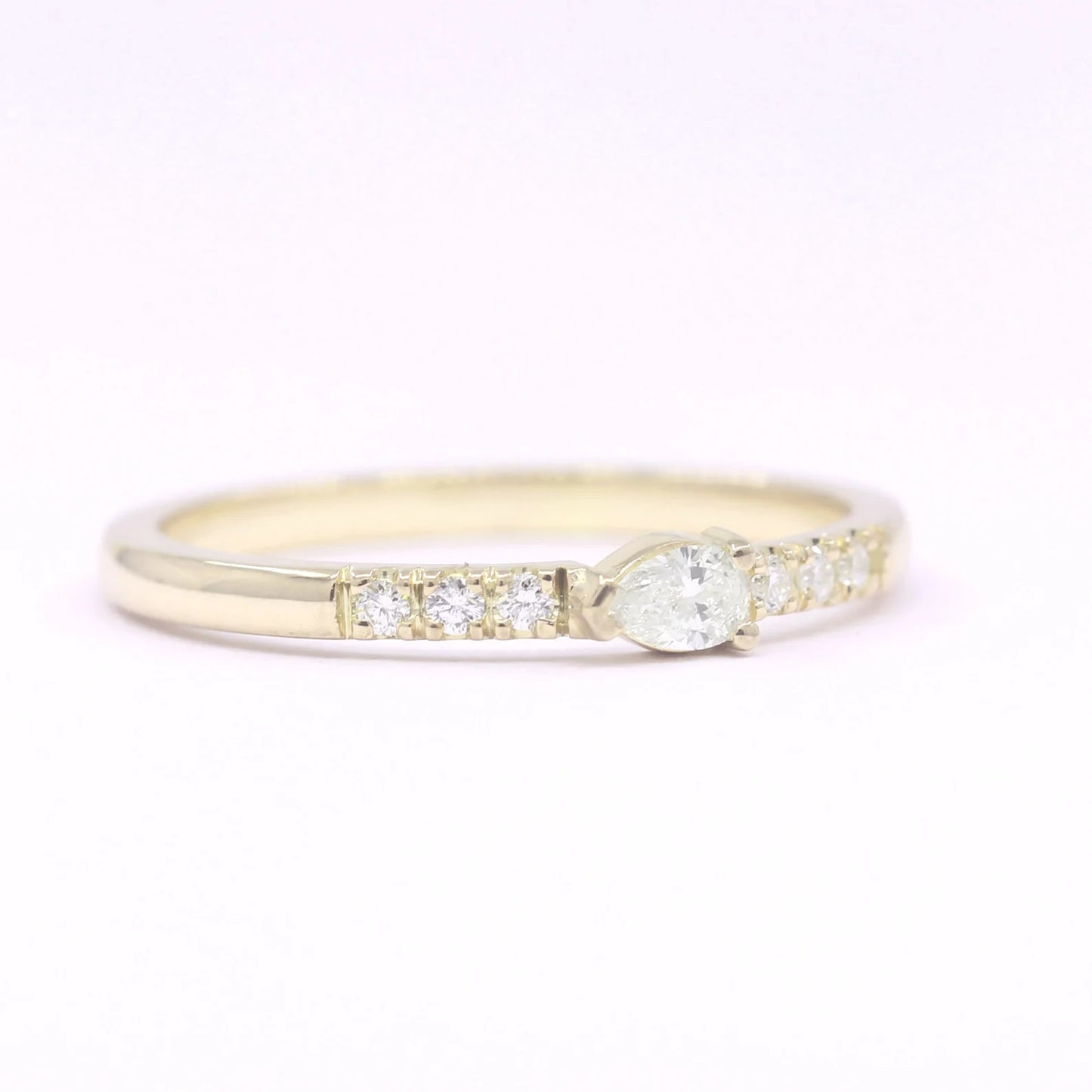 14K 0.10CT PEAR DIAMOND BAND