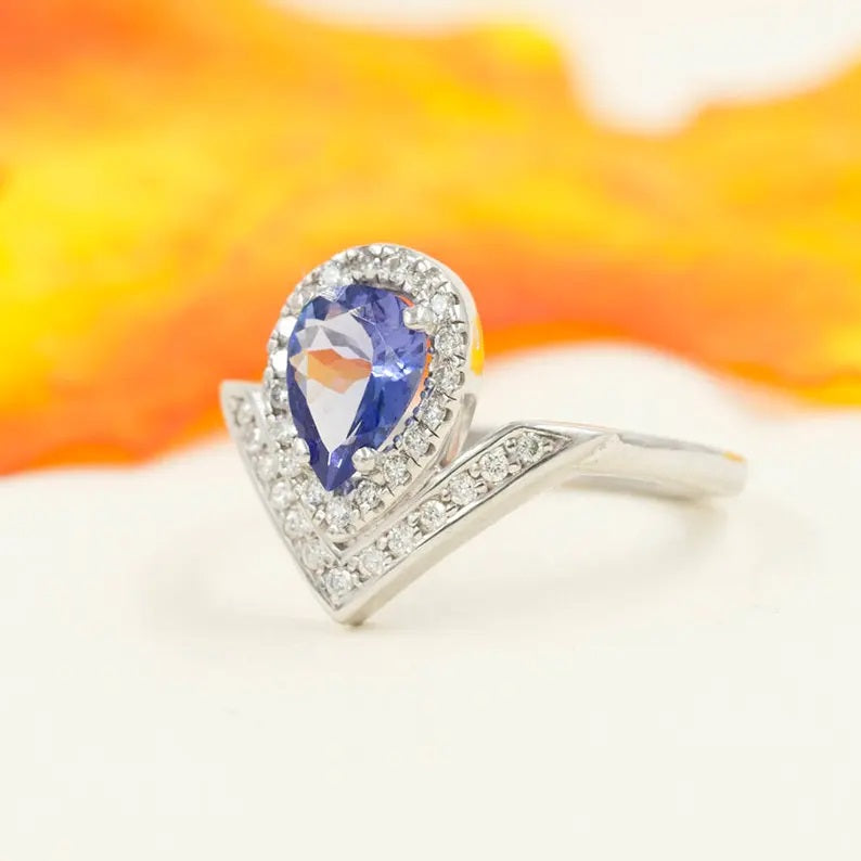 14K PEAR TANZANITE DIAMOND HALO V RING