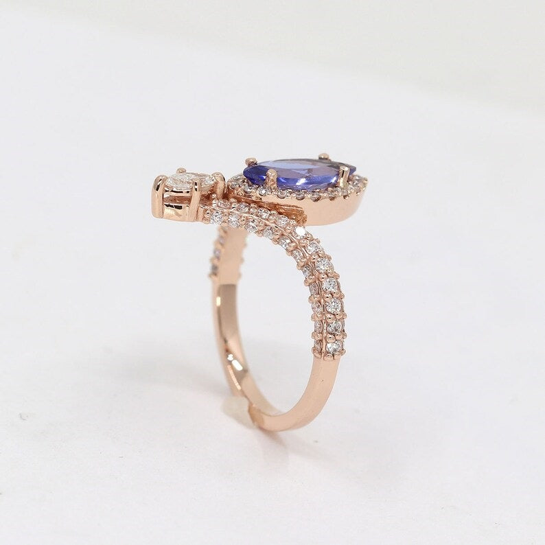 14K MARQUISE TANZANITE DIAMOND HALO CHEVRON RING