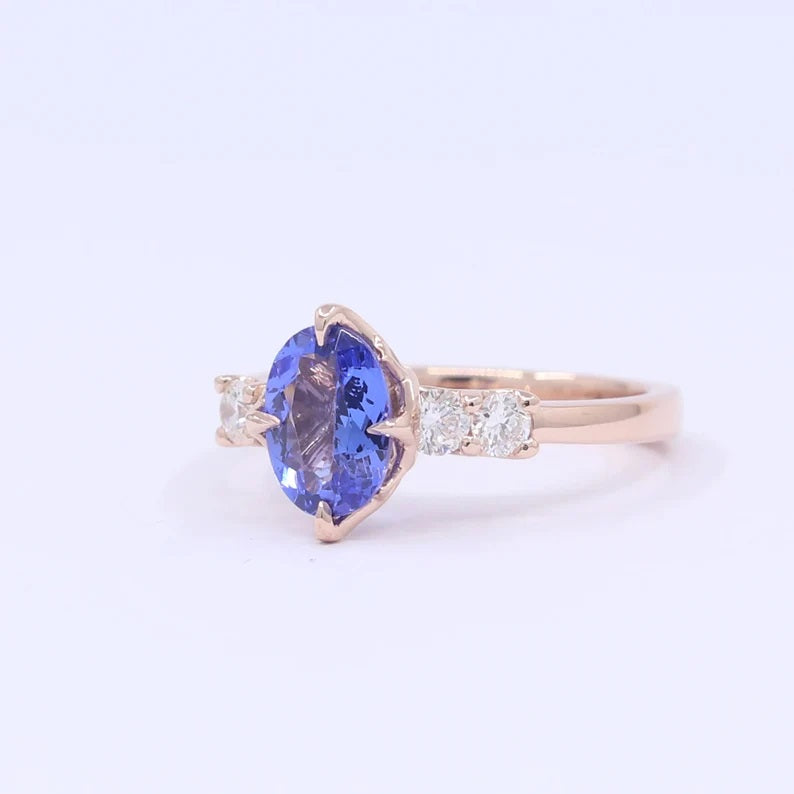 14K OVAL TANZANITE DIAMOND RING