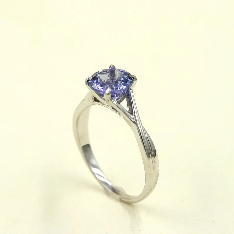 14K TANZANITE TWIST SOLITAIRE RING