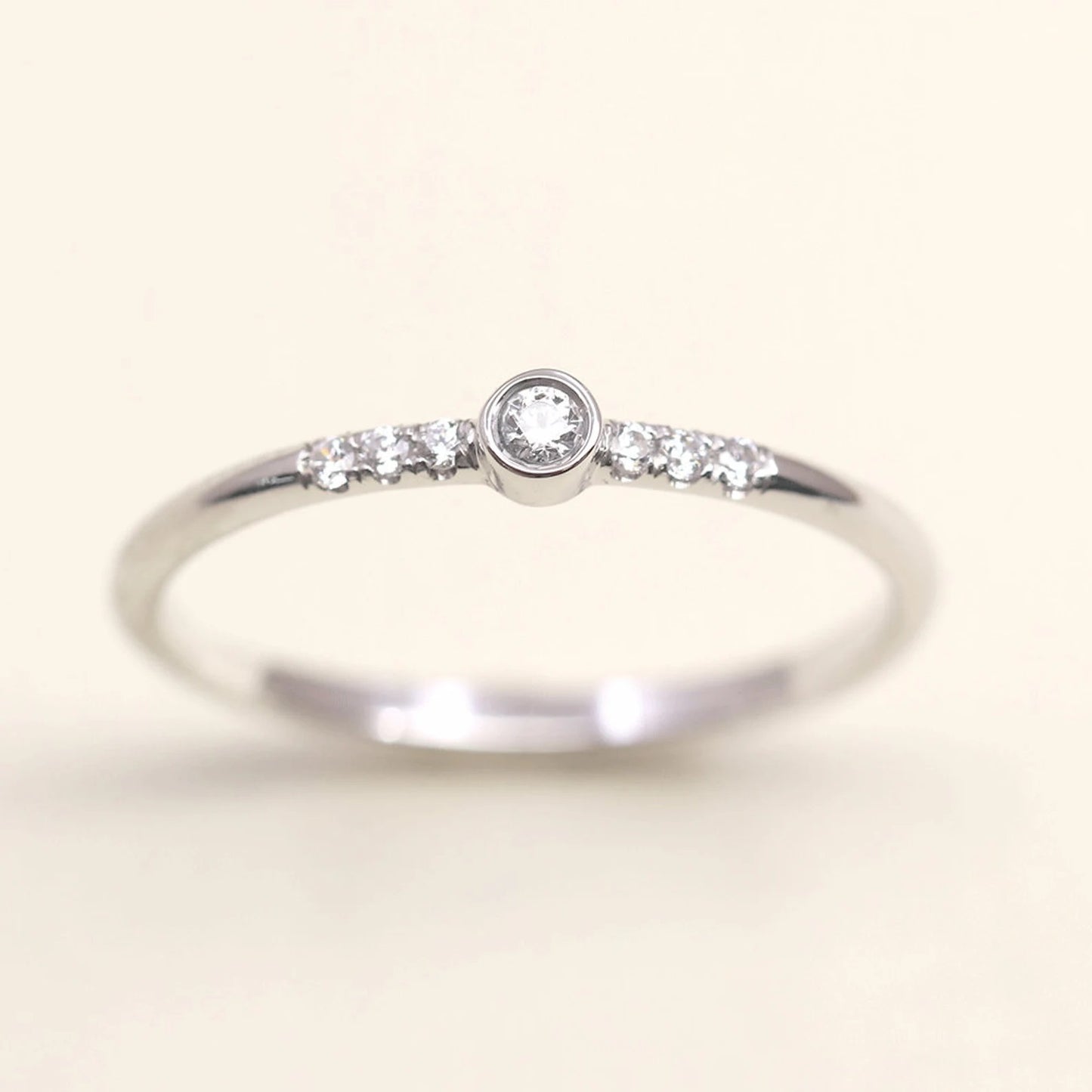 14K 0.10CT DIAMOND BEZEL RING