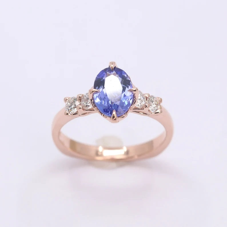 14K OVAL TANZANITE DIAMOND RING