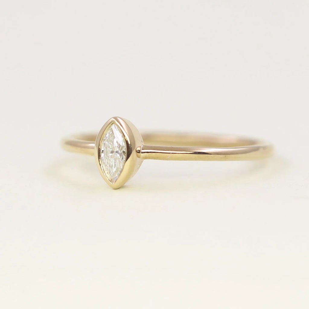 14K 0.15CT MARQUISE DIAMOND BEZEL SOLITAIRE RING