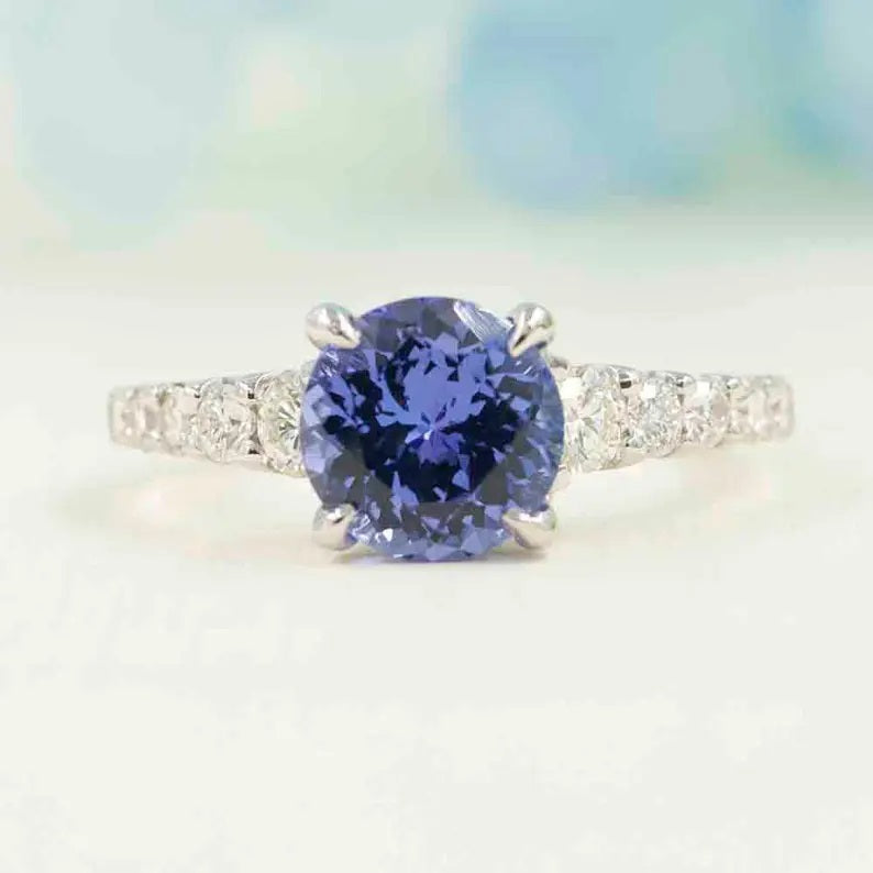 14K TANZANITE DIAMOND SOLITAIRE RING