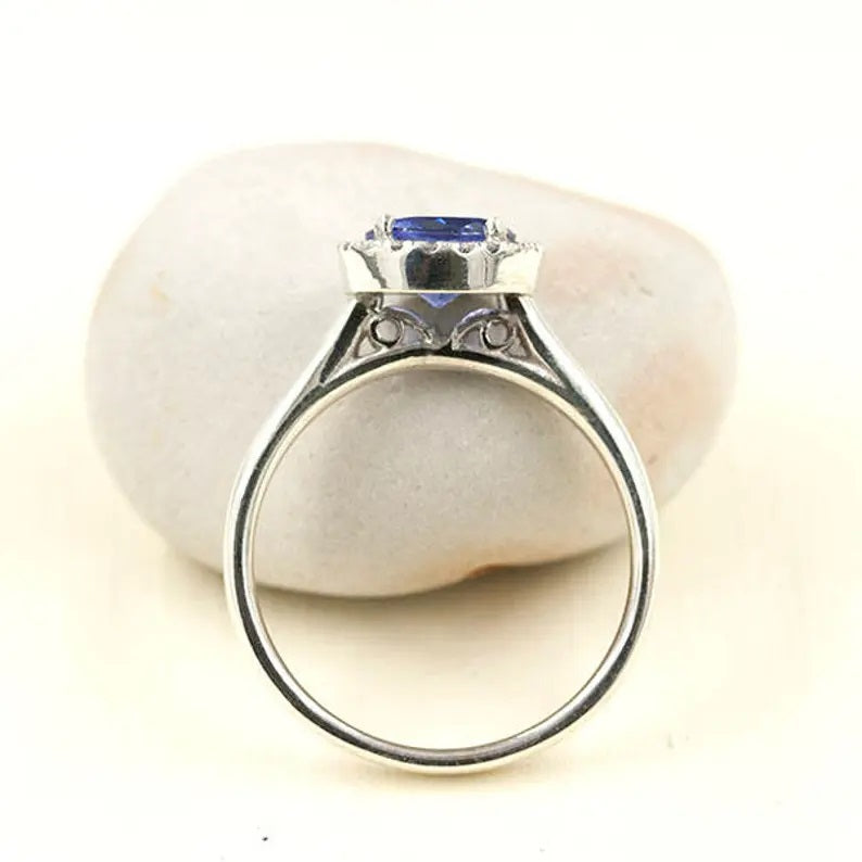 14K TANZANITE DIAMOND HALO SOLITAIRE RING