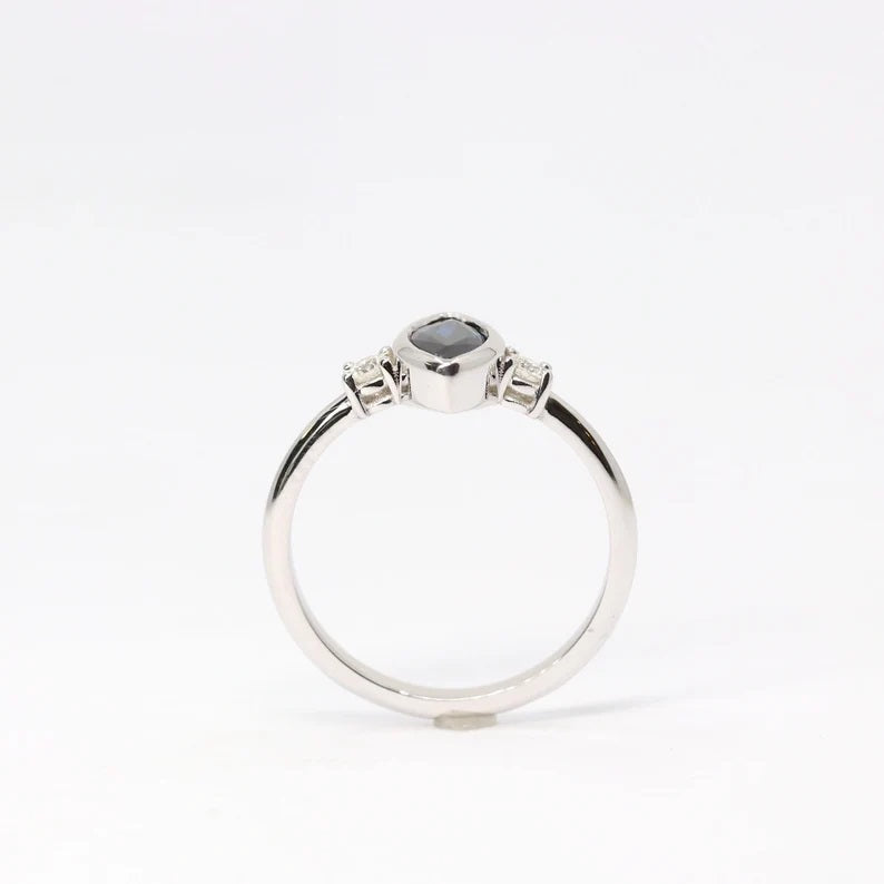 14K MARQUISE SAPPHIRE BEZEL 0.10CT DIAMOND RING