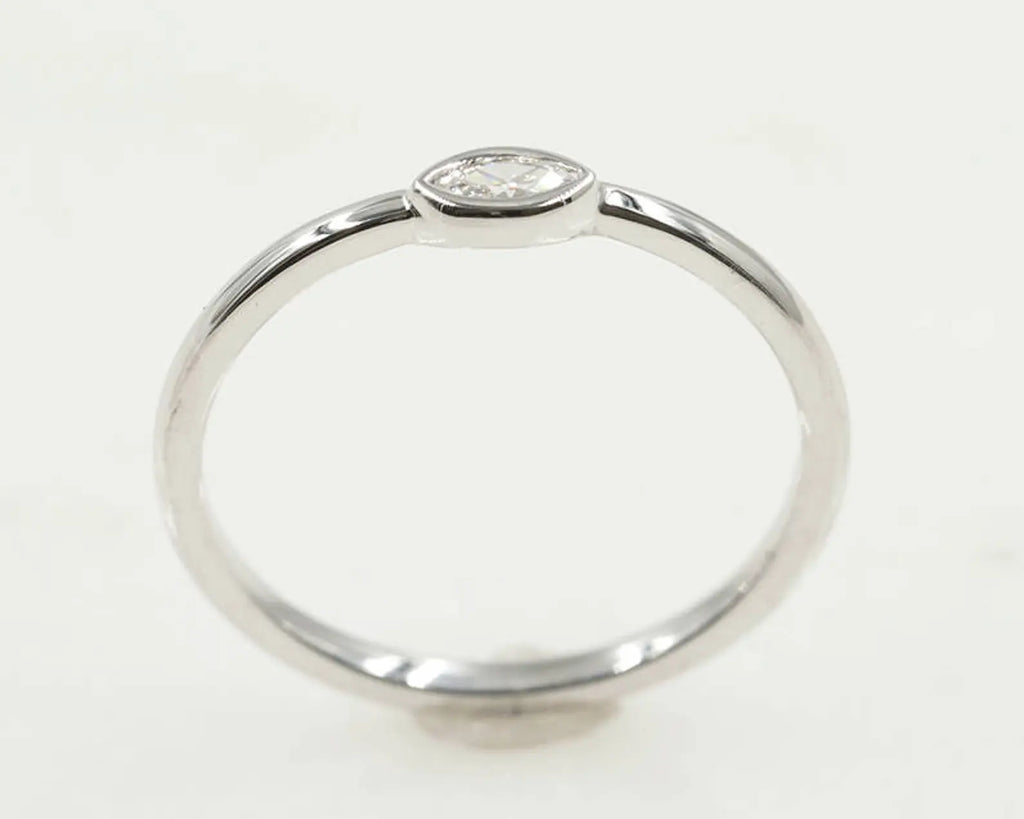 14K 0.075CT MARQUISE DIAMOND BEZEL SOLITAIRE RING