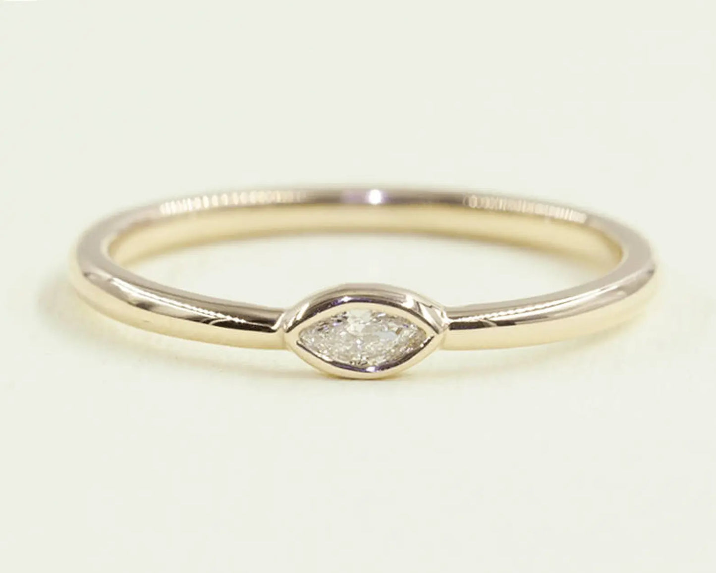 14K 0.075CT MARQUISE DIAMOND BEZEL SOLITAIRE RING