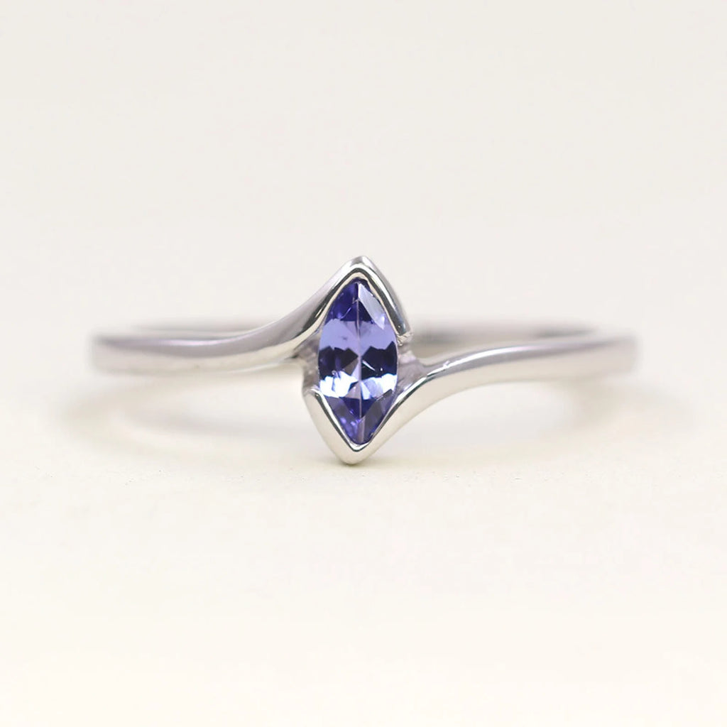 14K MARQUISE TANZANITE BEZEL SOLITAIRE RING