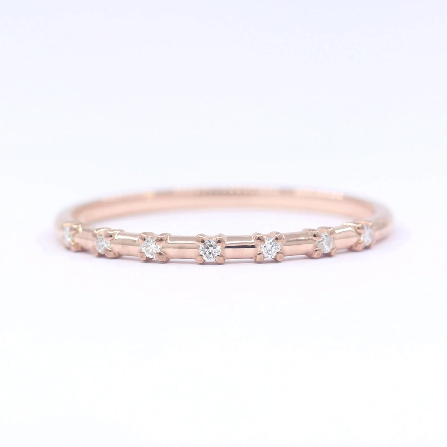 14K 7 DIAMOND SPACED 1.2MM BAND