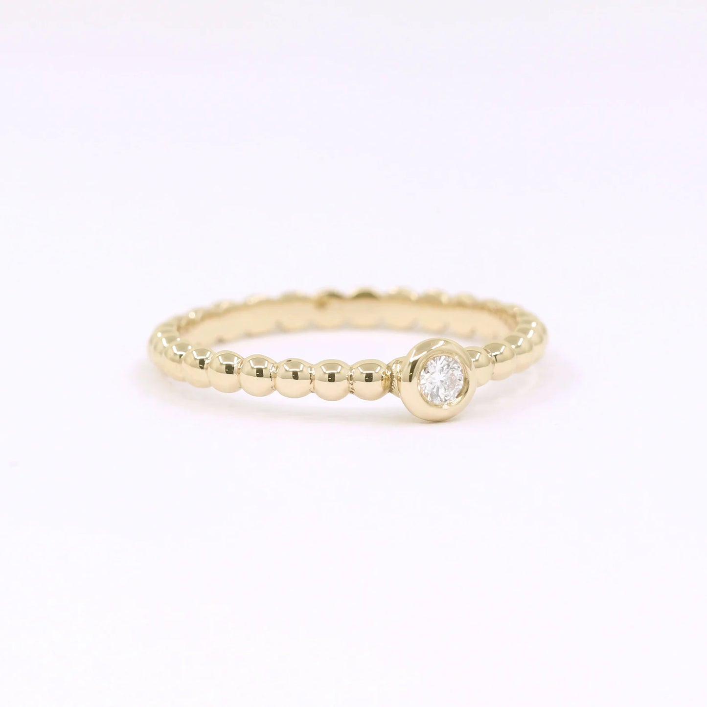 14K 0.05CT DIAMOND BEZEL BEADED RING