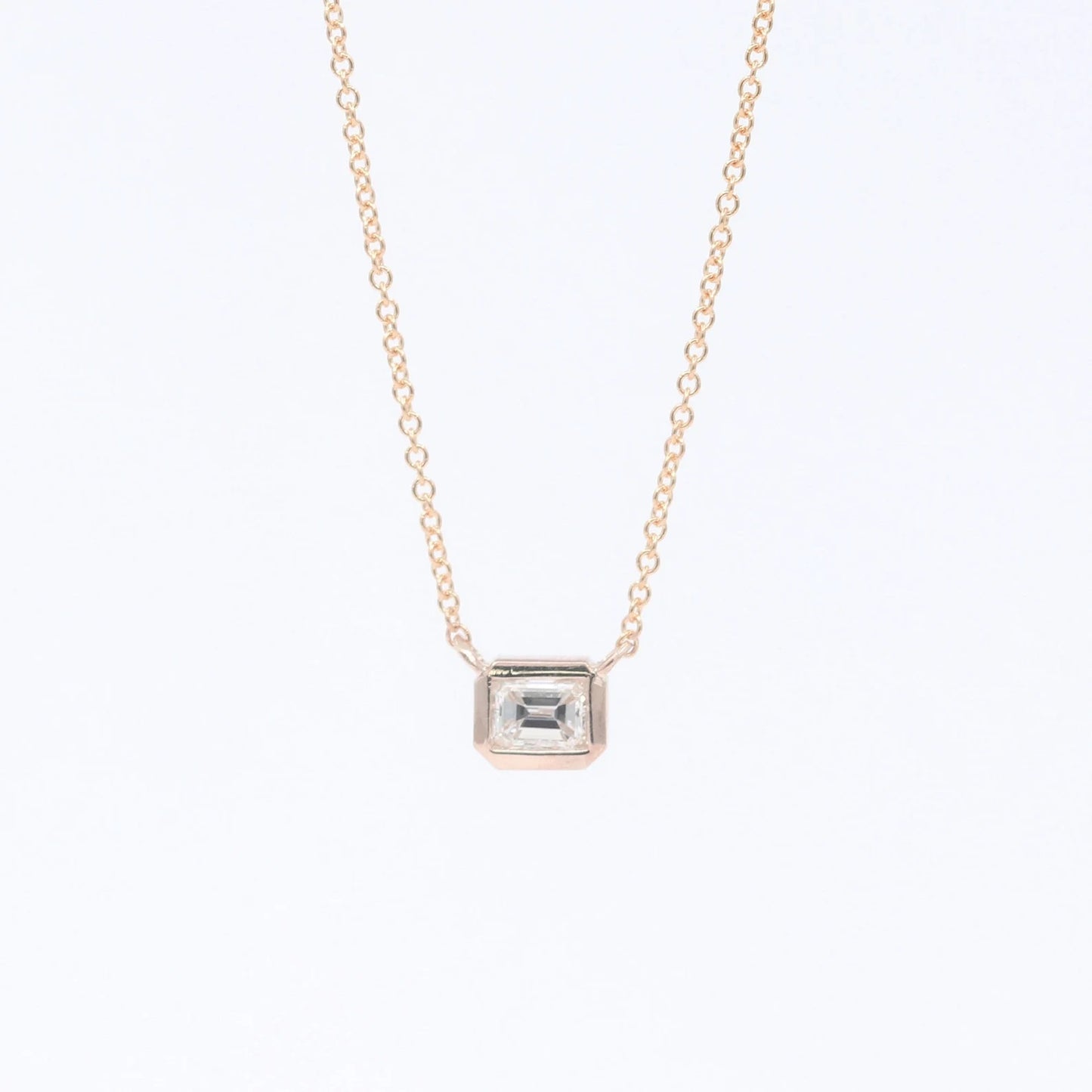 14K 0.25CT EMERALD CUT DIAMOND BEZEL NECKLACE